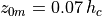 z_{0m}
= 0.07\,h_c