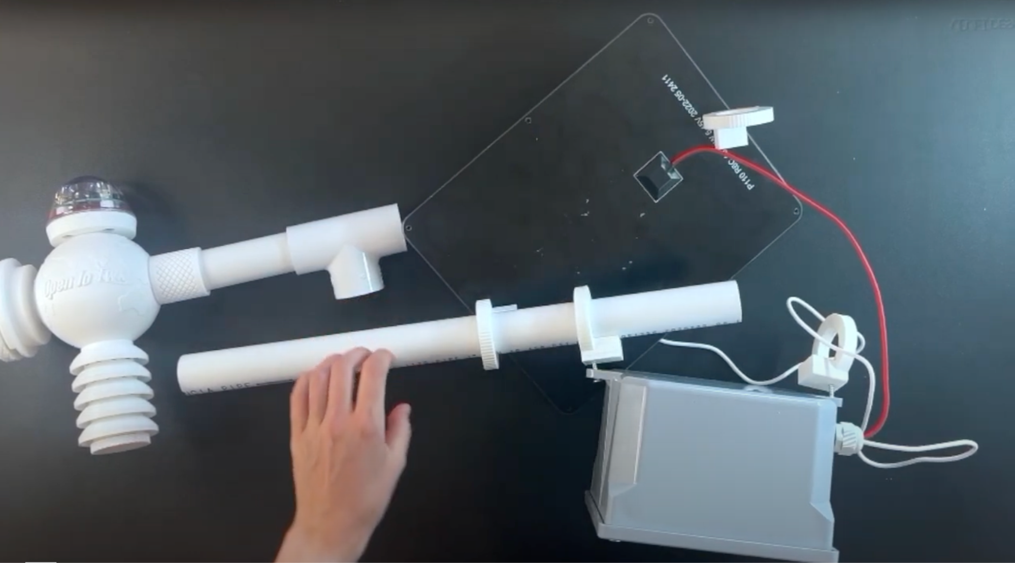 First mounts of solar panel and junction box on PVC pipe